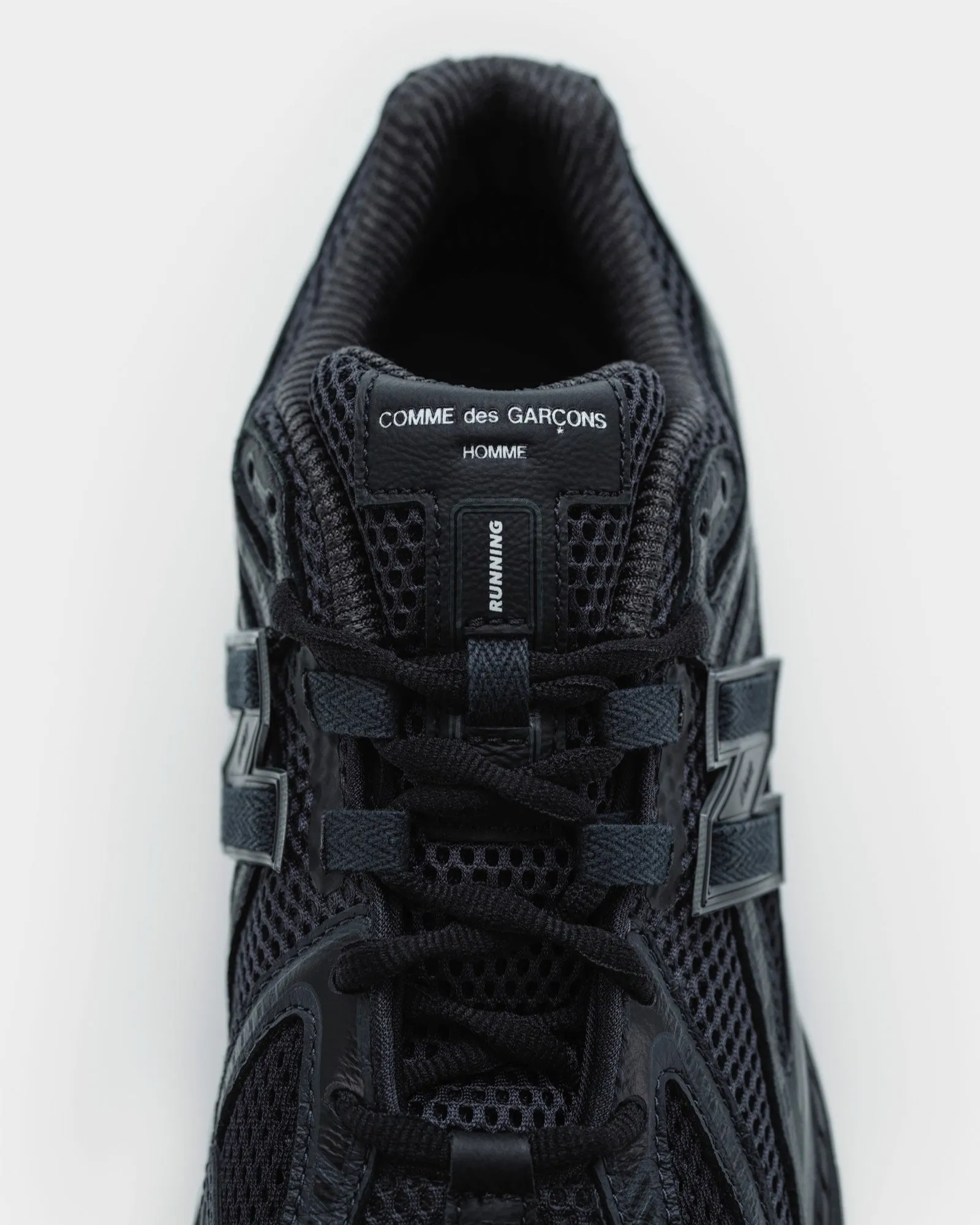 CDG x New Balance in Black/Black