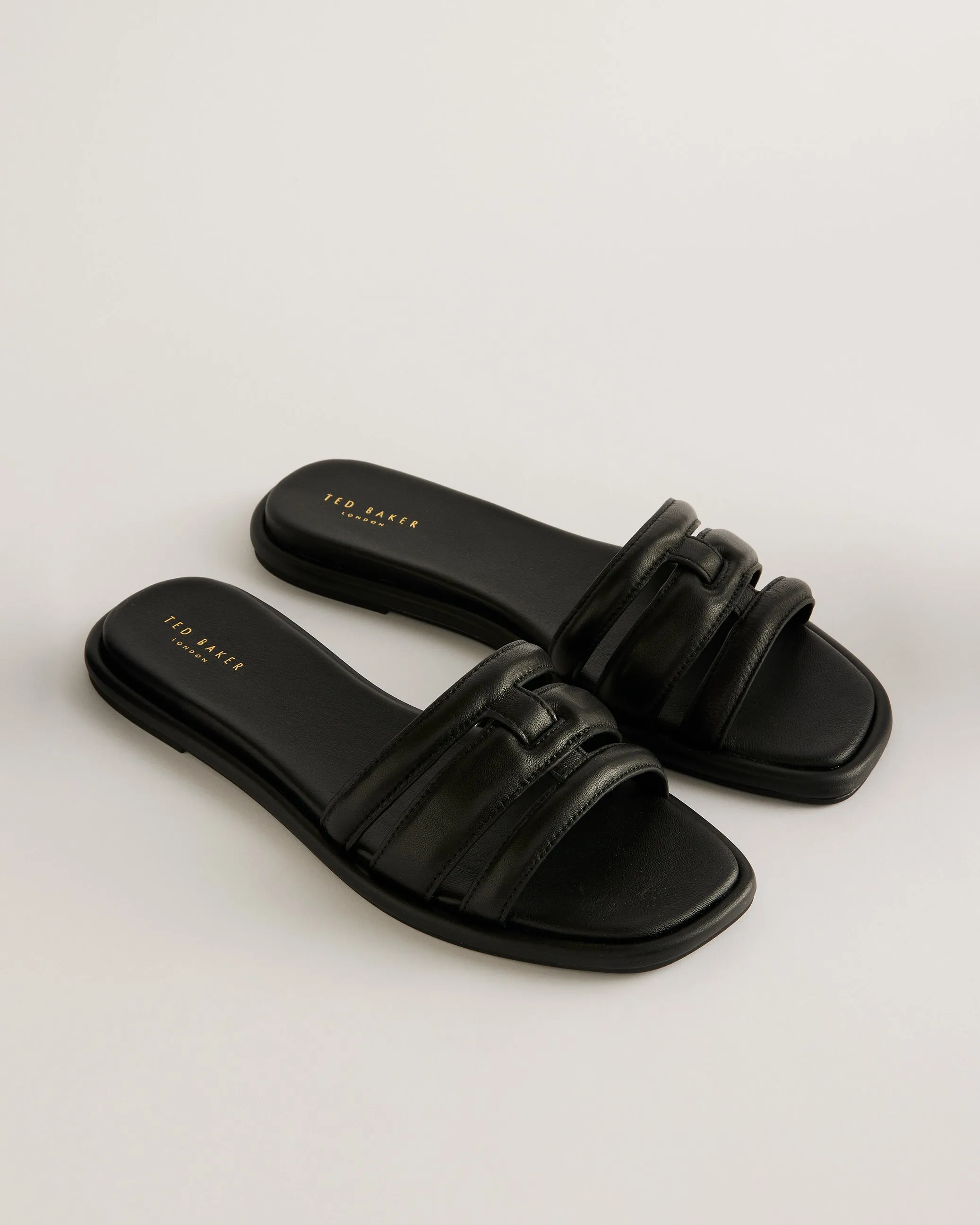 Leeiaa Flat Woven T Logo Slide Sandal Black